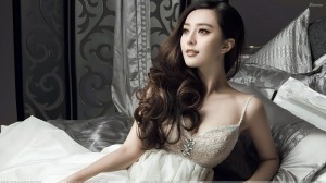 Fan Bingbing Cute Sitting Pose In White Long Dress